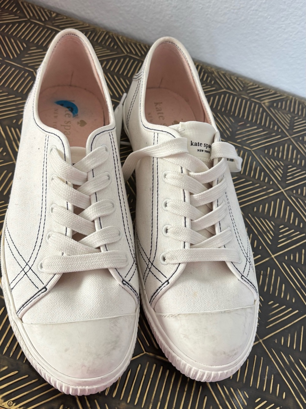 kate spade cream canvas sneakers with navy stitching